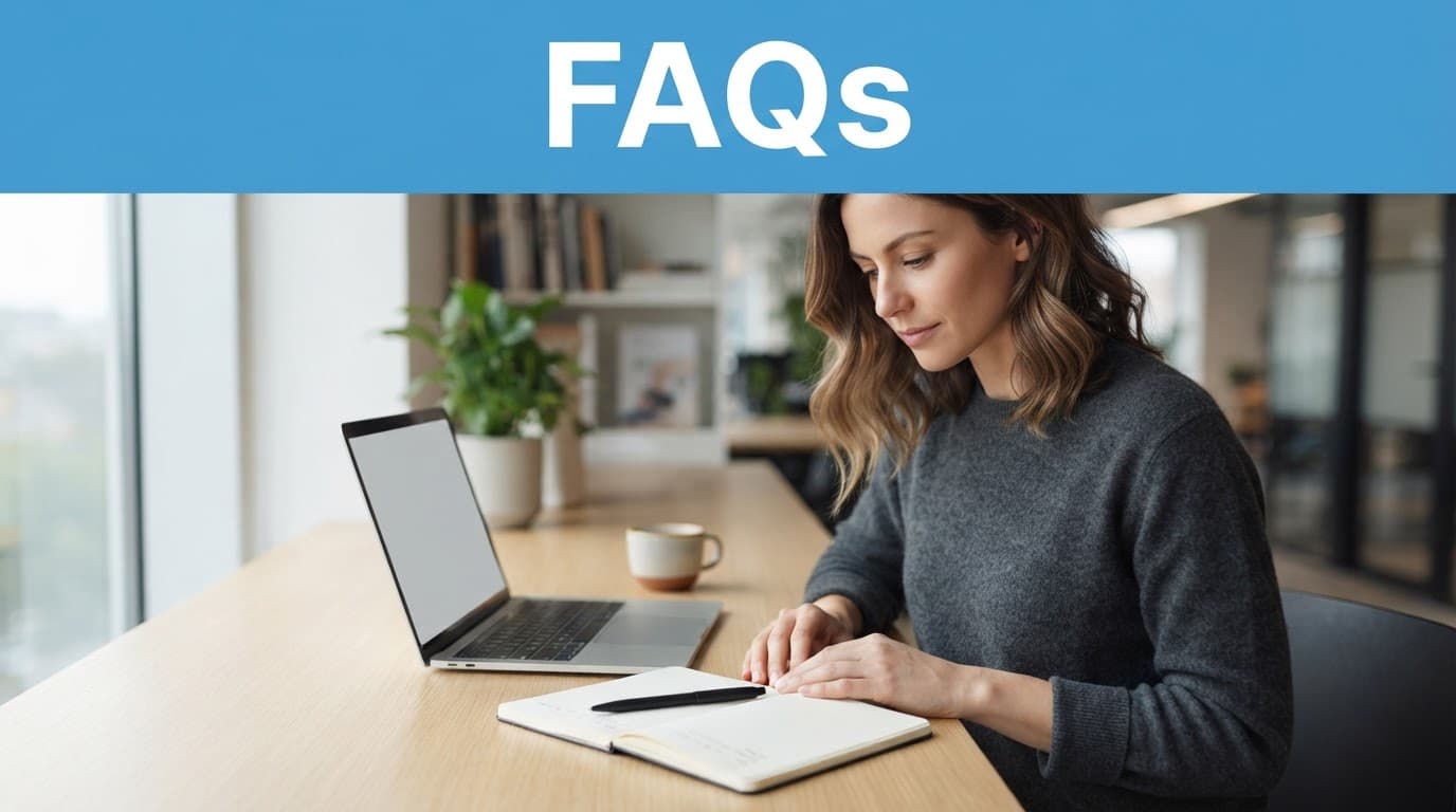 A notebook and pen on a desk beneath a blue FAQs banner with one person nearby.